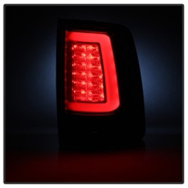 Load image into Gallery viewer, Spyder 13-14 Dodge Ram 1500 LED Tail Lights - Red Clear ALT-YD-DRAM13V2-LED-RC
