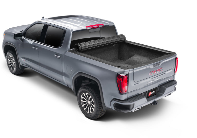 Load image into Gallery viewer, BAK 19-21 GM Sierra 1500 (Carbon Pro Bed Cover) Revolver X4s 5.9ft Bed Cover
