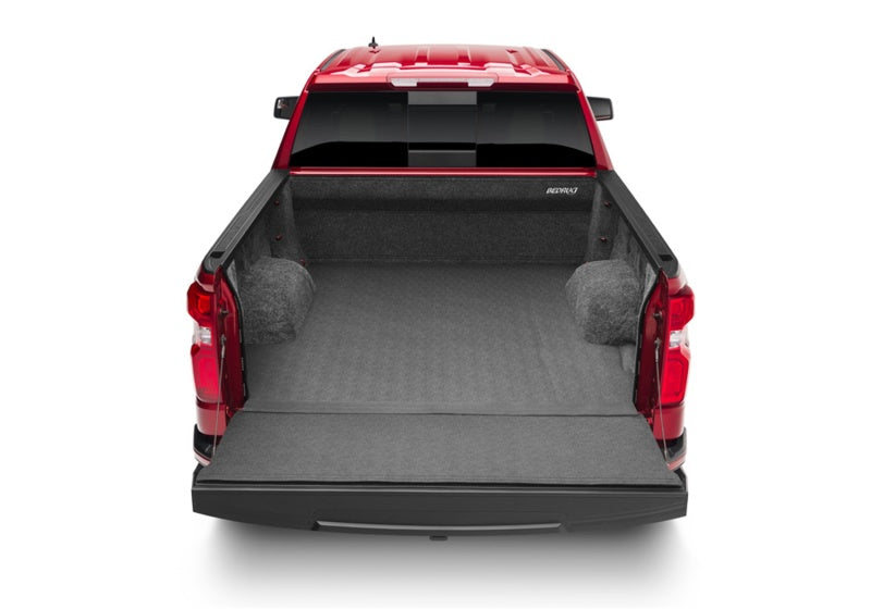 Load image into Gallery viewer, BedRug 2019+ GM Silverado/Sierra 6ft 6in Bed (w/ Multi-Pro Tailgate) Impact Bedliner
