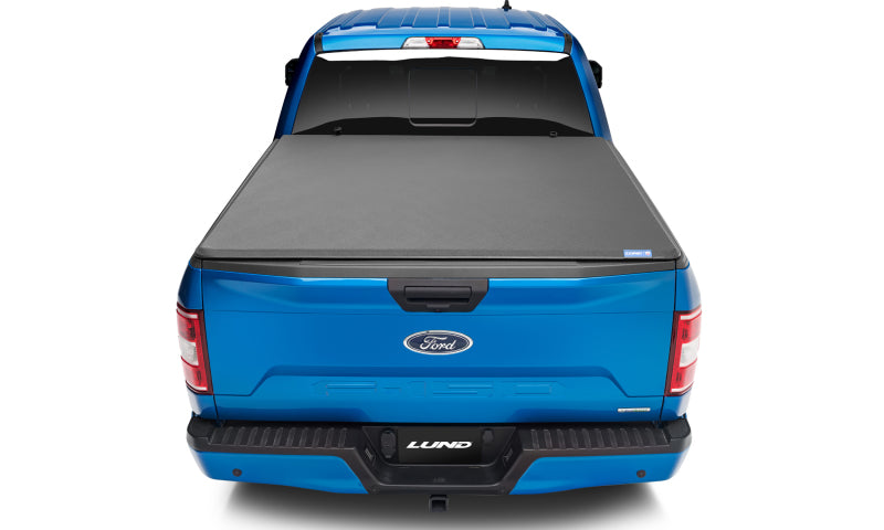 Load image into Gallery viewer, Lund 04-14 Ford F-150 (5.5ft. Bed) Genesis Elite Tri-Fold Tonneau Cover - Black
