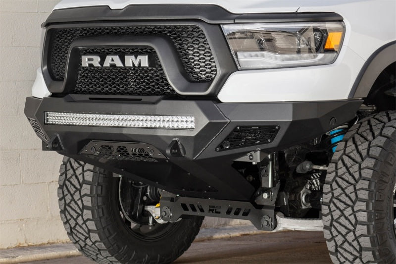 Load image into Gallery viewer, Addictive Desert Designs 2019 Ram Rebel 1500 Stealth Fighter Fr Bumper w/Parking Sensor Cutouts
