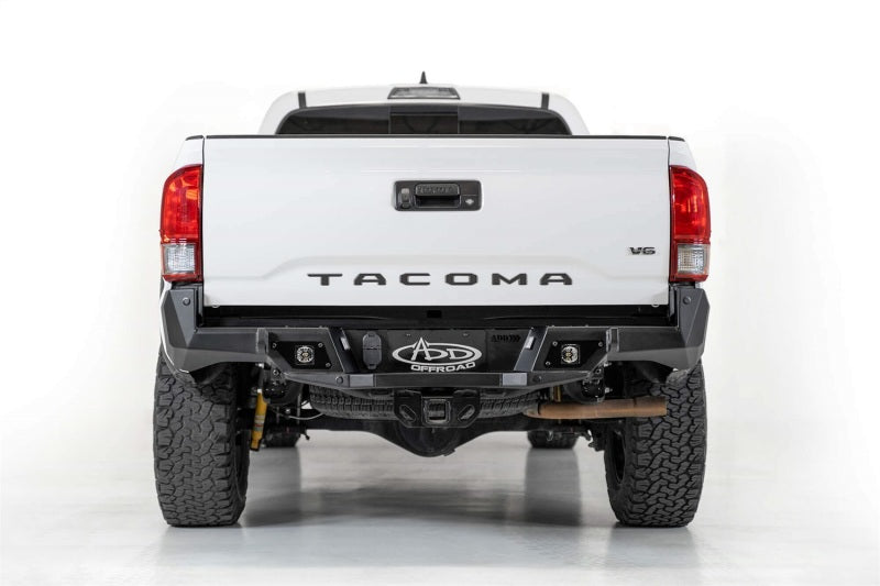 Load image into Gallery viewer, Addictive Desert Designs 16-19 Toyota Tacoma Stealth Fighter Rear Bumper w/ Backup Sensor Cutouts
