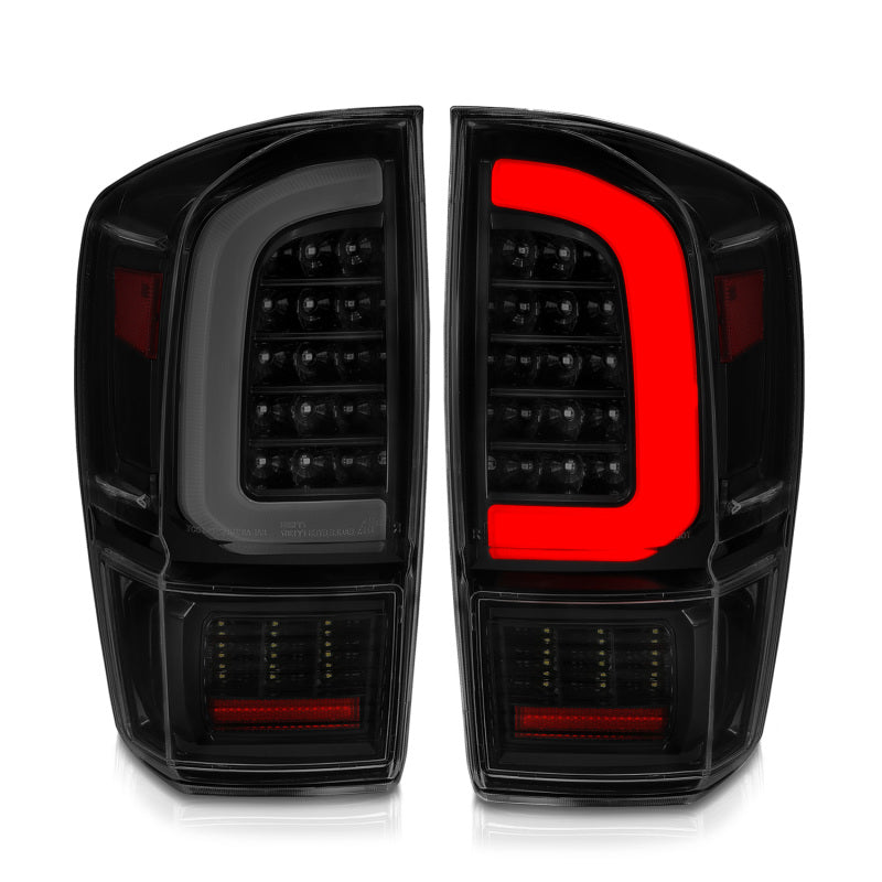 Load image into Gallery viewer, ANZO 16-21 Toyota Tacoma LED Tail Lights - w/ Light Bar Sequential Black Housing &amp; Smoke Lens
