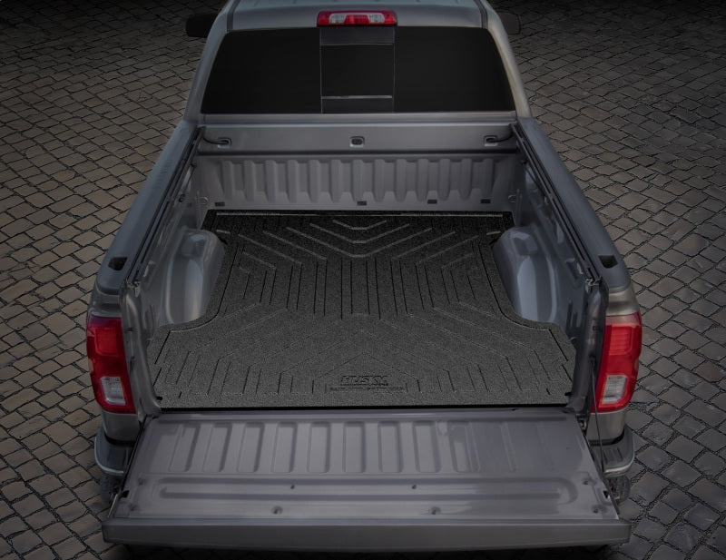 Load image into Gallery viewer, Husky Liners 20-24 Silverado/Sierra 2500/3500 HD 82.2 Bed Heavy Duty Bed Mat
