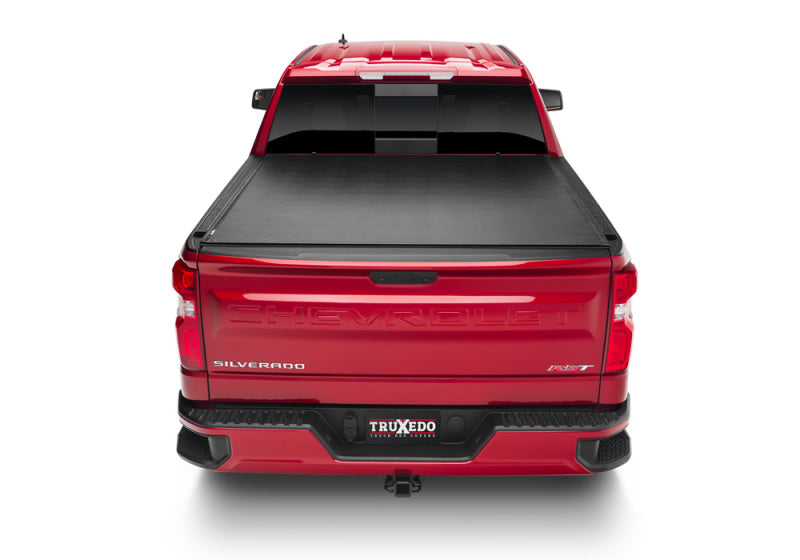 Load image into Gallery viewer, Truxedo 20-21 GMC Sierra &amp; Chevrolet Silverado 1500 (New Body) w/CarbonPro 5ft 9in Sentry Bed Cove
