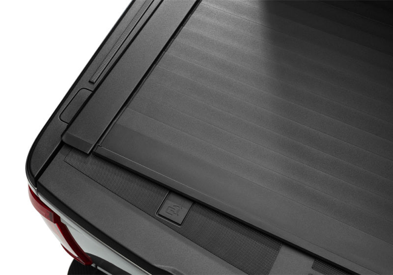 Load image into Gallery viewer, Roll-N-Lock 2021 Ford F-150 67.1in E-Series Retractable Tonneau Cover
