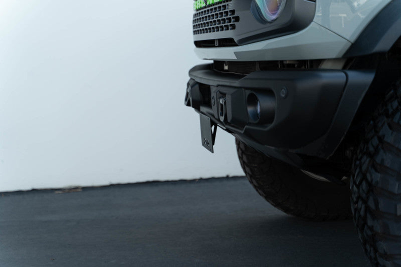 Load image into Gallery viewer, DV8 Offroad 21-23 Ford Bronco Capable Bumper Front License Plate Mount

