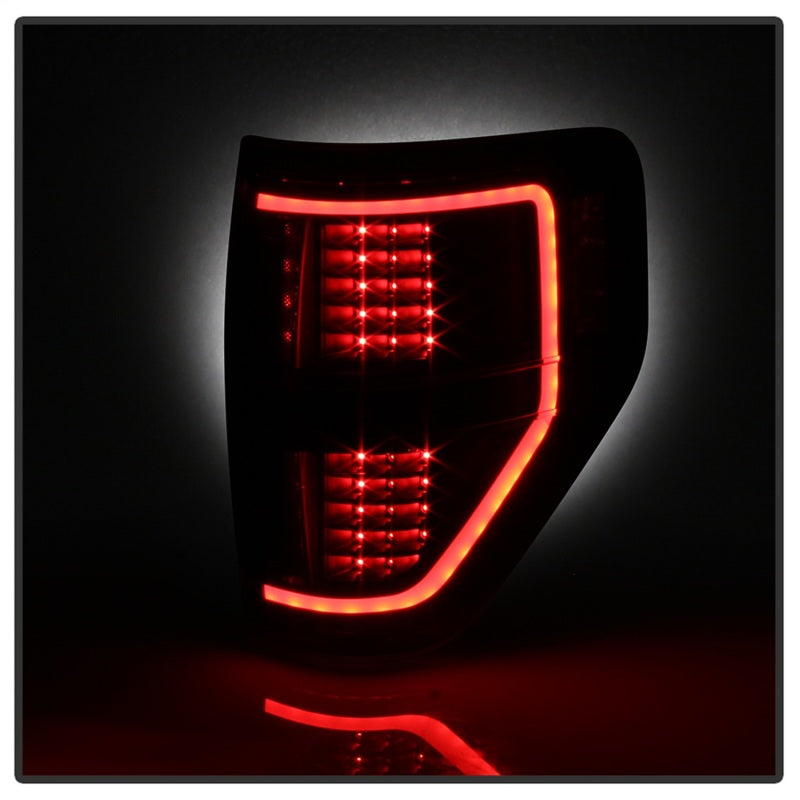 Load image into Gallery viewer, xTune 09-14 Ford F-150 Light Bar LED Tail Lights - Black (ALT-JH-FF15009-LBLED-BK)
