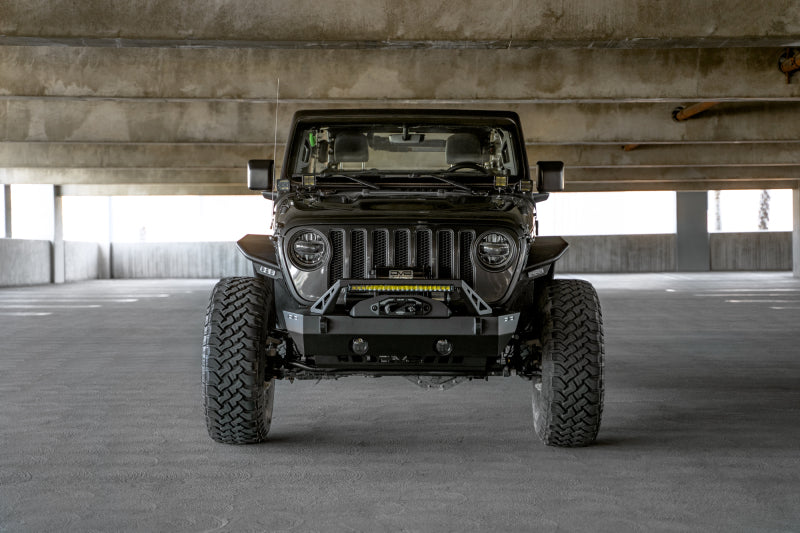 Load image into Gallery viewer, DV8 Offroad 07-23 Jeep Wrangler/Gladiator JT/JK/JL FS-25 Stubby Front Bumper w/Plated Bull Bar
