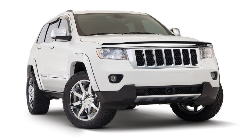 Load image into Gallery viewer, Bushwacker 11-18 Jeep Grand Cherokee Pocket Style Flares 4pc Does Not Fit SRT8 - Black
