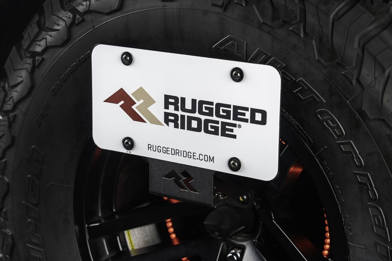 Load image into Gallery viewer, Rugged Ridge Tag Relocation Bracket Rear 18-20 Jeep Wrangler JL
