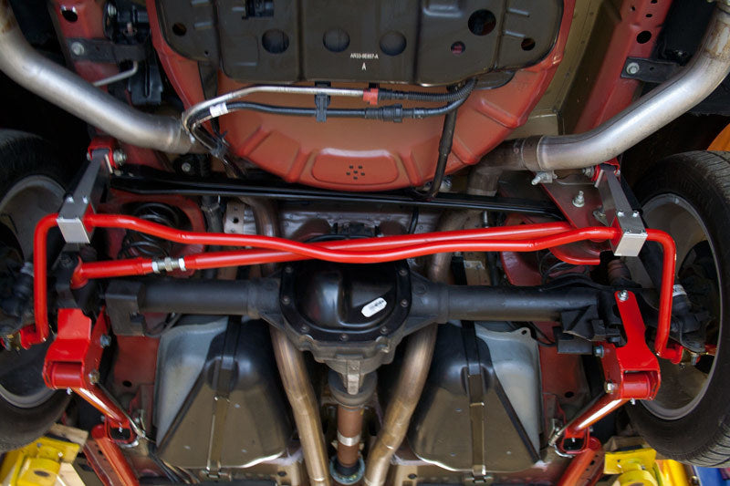 Load image into Gallery viewer, UMI Performance 05-14 Ford Mustang Rear Sway Bar- 22mm Solid CrMo
