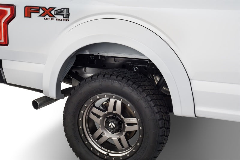 Load image into Gallery viewer, Bushwacker 15-17 Ford F-150 Styleside Extend-A-Fender Style Flares 4pc 67.1/78.9/97.6in Bed - Black
