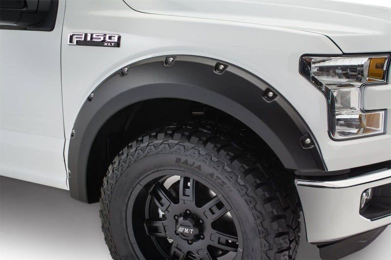 Load image into Gallery viewer, Bushwacker 15-17 Ford F-150 Styleside Pocket Style Flares 4pc 67.1/78.9/97.6in Bed - Black
