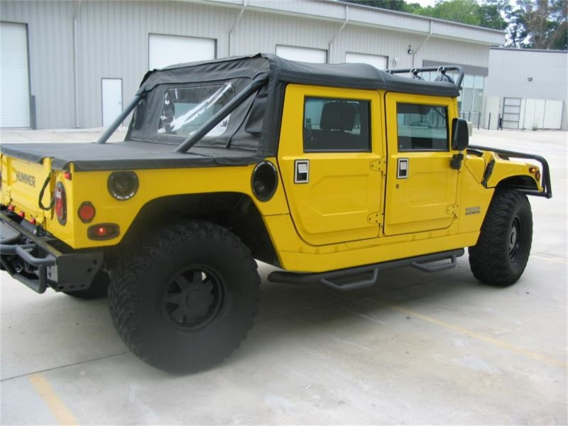 Load image into Gallery viewer, N-Fab Nerf Step 00-06 Hummer H1 SUV 4 Door - Gloss Black - W2W - 3in
