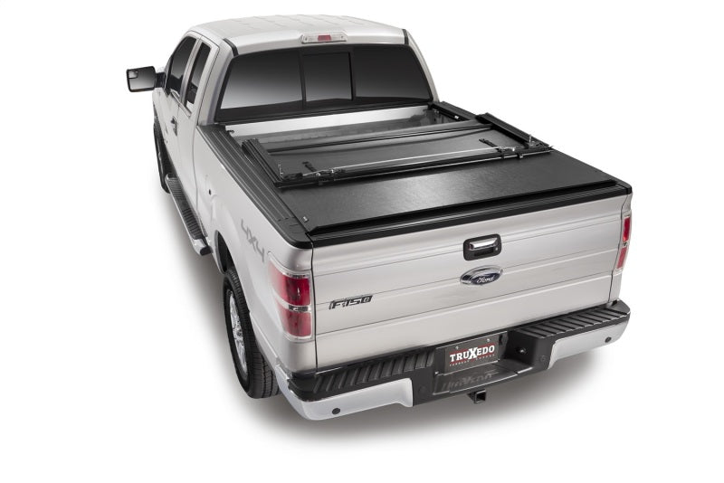 Load image into Gallery viewer, Truxedo 08-15 Nissan Titan 7ft Deuce Bed Cover
