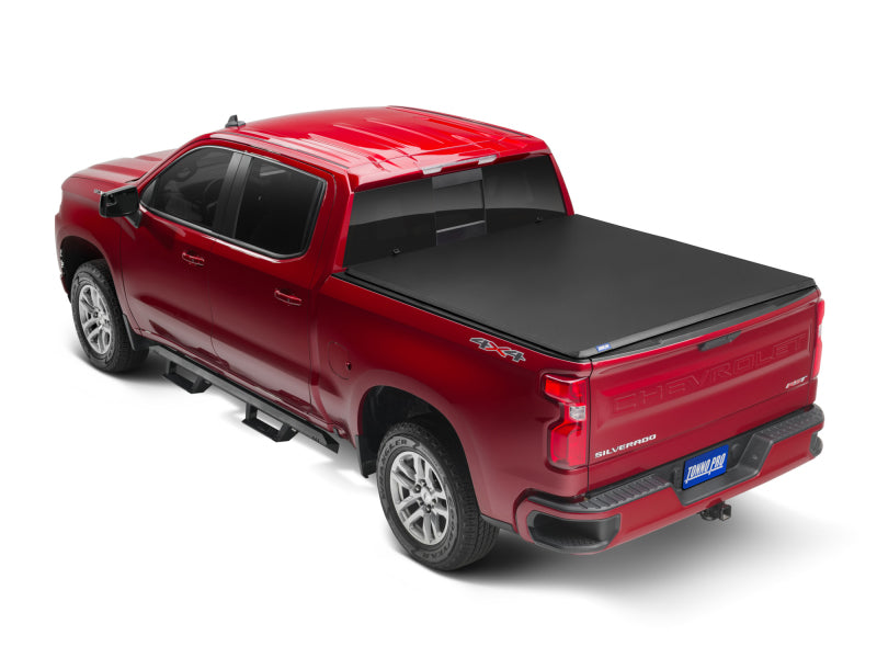 Load image into Gallery viewer, Tonno Pro 04-15 Nissan Titan 5.5ft (Incl 42-498 Utility Track Kit) Hard Fold Tonneau Cover
