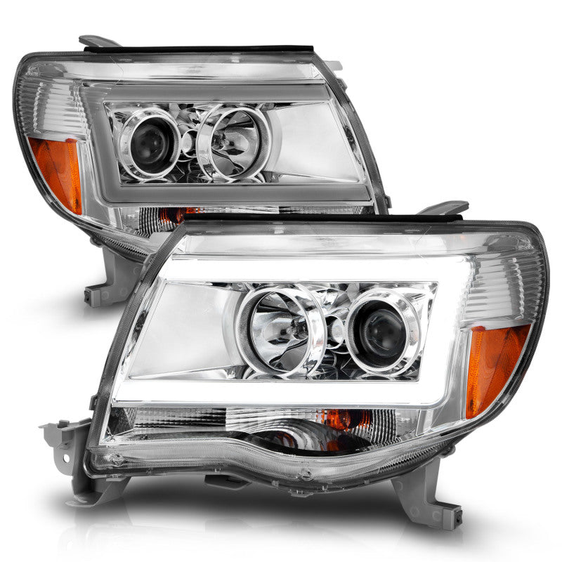 Load image into Gallery viewer, ANZO 2005-2011 Toyota Tacoma Projector Headlights w/ Light Bar Chrome Housing
