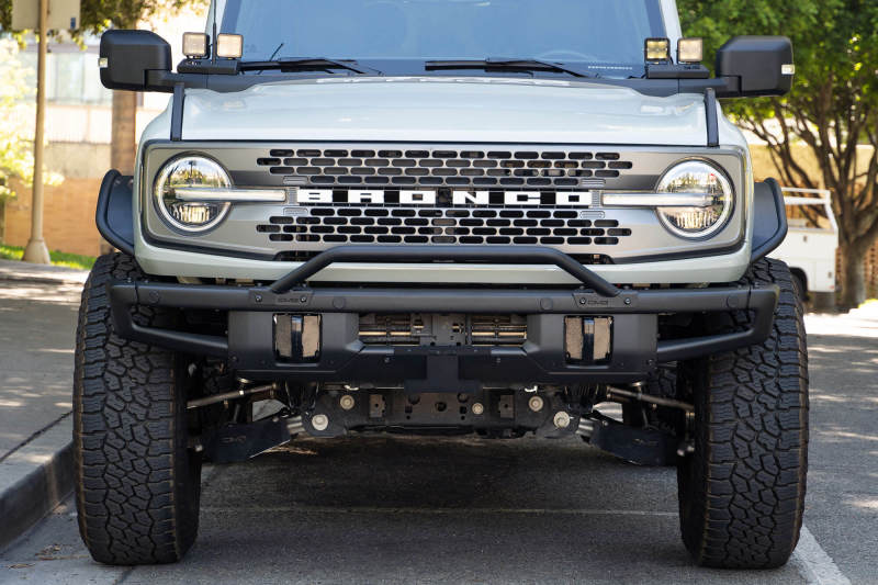 Load image into Gallery viewer, DV8 Offroad 21-22 Ford Bronco Factory Front Bumper Licence Relocation Bracket - Front
