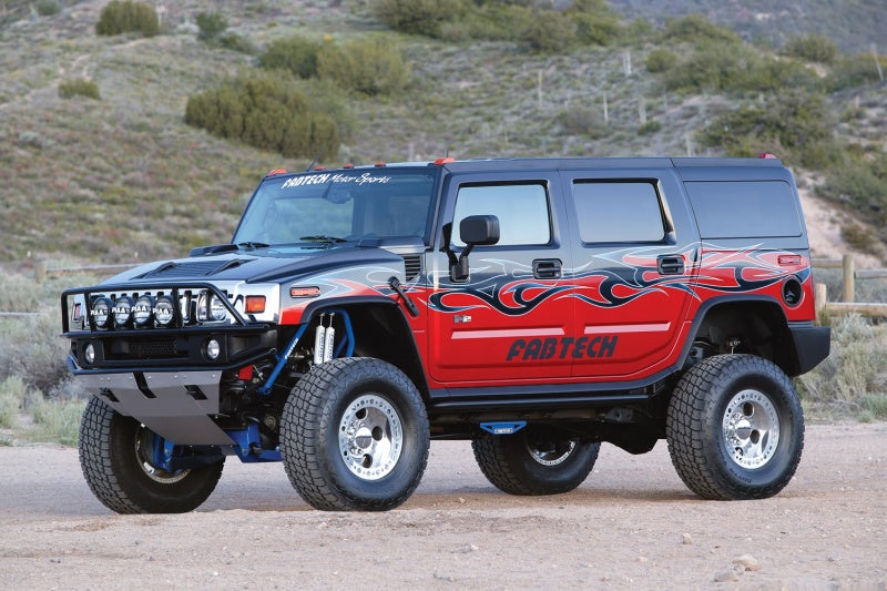 Load image into Gallery viewer, Fabtech 03-08 Hummer H2 Suv/Sut 4WD w/Rr Coil Springs 6in Perf Sys w/Perf Shks
