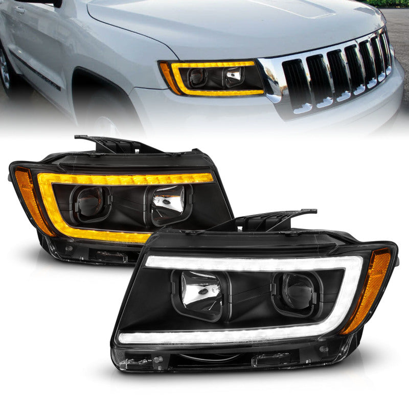 Load image into Gallery viewer, ANZO 11-13 Jeep Grand Cherokee (Factory Halogen Only) Projector Headlights w/Light Bar Swtchbk Black
