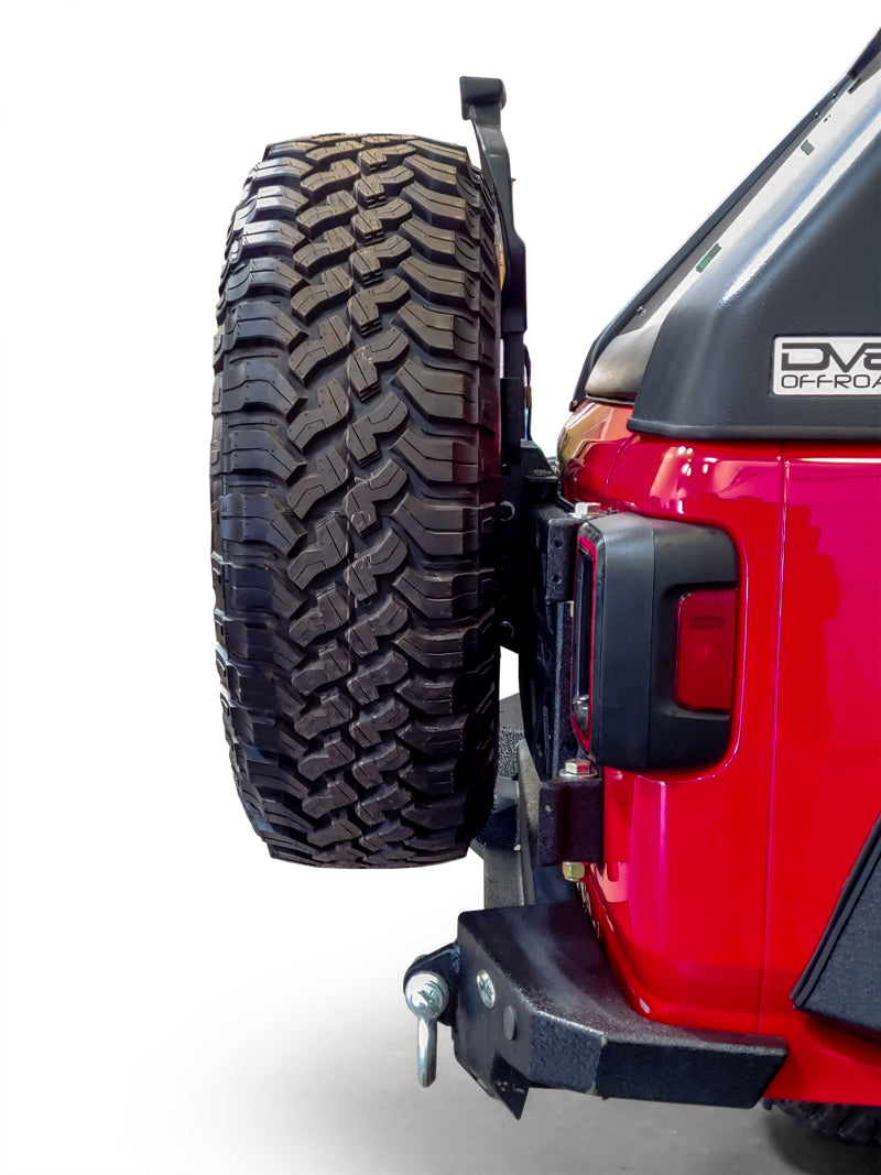 Load image into Gallery viewer, DV8 Offroad 2018+ Jeep Wrangler Tire Carrier
