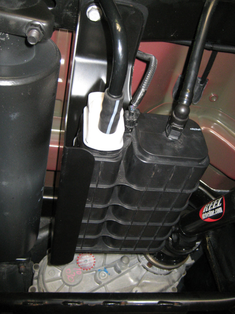 Load image into Gallery viewer, MBRP 2007-2009 Jeep Wrangler JK Heat Shield Charcoal Canister Repositioning Kit
