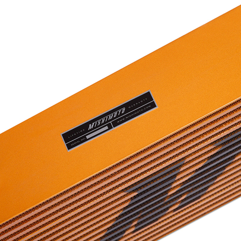 Load image into Gallery viewer, Mishimoto Universal Gold R Line Intercooler Overall Size: 31x12x4 Core Size: 24x12x4 Inlet / Outlet
