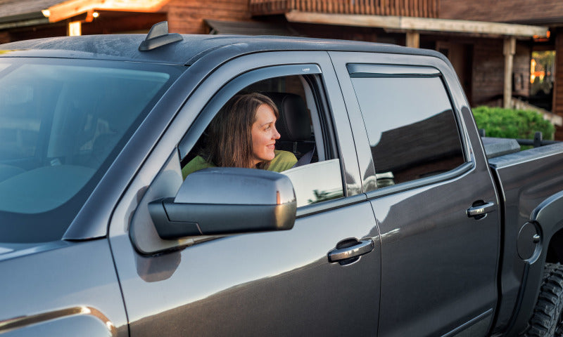 Load image into Gallery viewer, Lund 04-14 Ford F-150 SuperCab Ventvisor Elite Window Deflectors - Smoke (4 Pc.)
