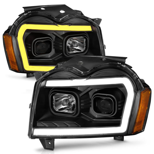 ANZO 2005-2007 Jeep Grand Cherokee Projector Headlights w/ Light Bar Switchback Black Housing