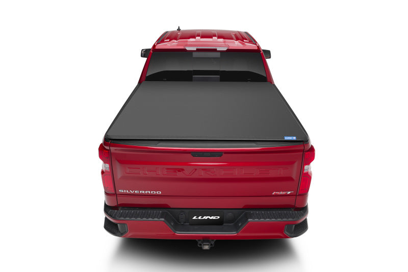 Load image into Gallery viewer, Lund 14-17 Chevy Silverado 1500 (6.5ft. Bed) Genesis Elite Tri-Fold Tonneau Cover - Black
