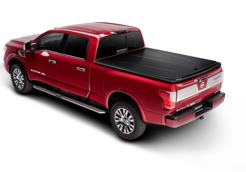 Load image into Gallery viewer, UnderCover 16-20 Nissan Titan 5.5ft SE Bed Cover - Black Textured
