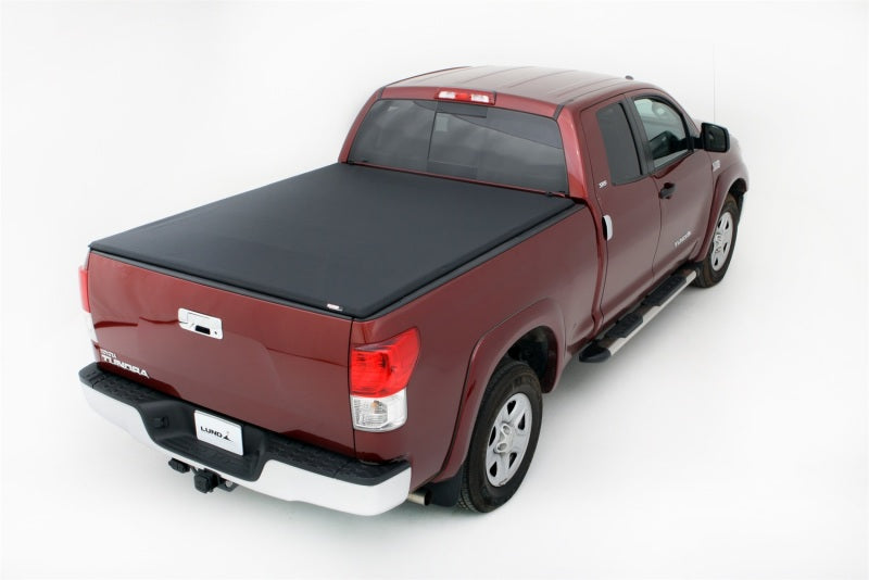 Load image into Gallery viewer, Lund 07-17 Toyota Tundra (5.5ft. Bed) Genesis Elite Tri-Fold Tonneau Cover - Black
