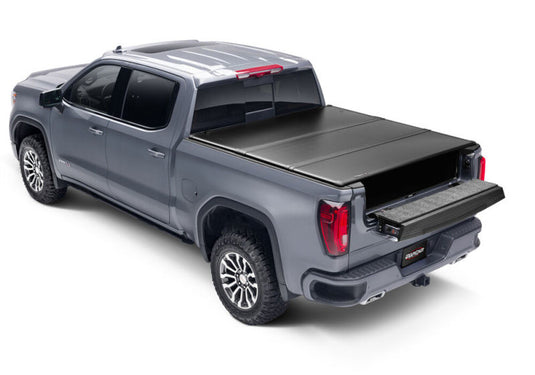 UnderCover 02-21 Ram 1500 5.7ft (Does not fit Rambox) Triad Bed Cover