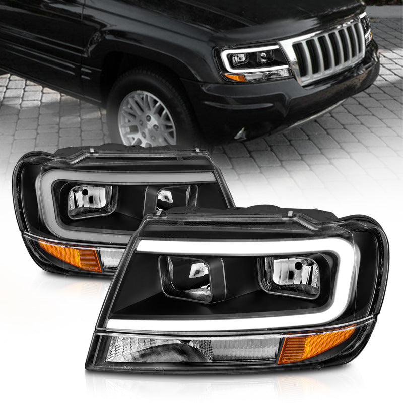 Load image into Gallery viewer, ANZO 99-04 Jeep Grand Cherokee Crystal Headlights - w/ Light Bar Black Housing
