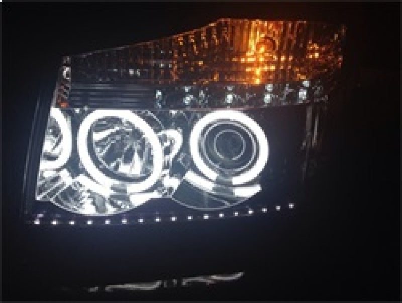 Load image into Gallery viewer, Spyder Nissan Titan 04-14/Armada 04-07 Projector Headlights CCFL Halo LED Blk PRO-YD-NTI04-CCFL-BK
