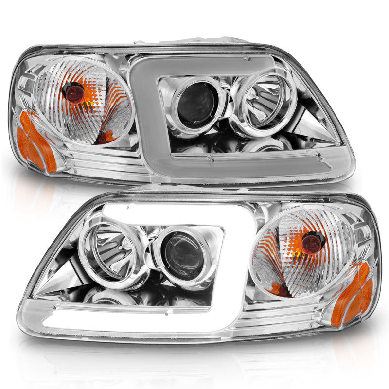 Load image into Gallery viewer, ANZO 1997-2003 Ford F-150 Projector Headlights w/ Light Bar Chrome Housing
