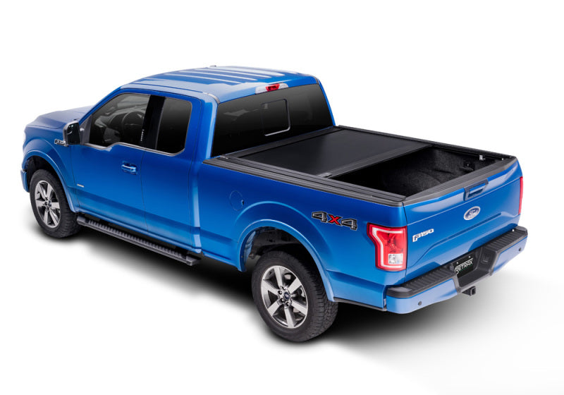 Load image into Gallery viewer, Retrax 04-up Titan Crew Cab 4-doors (w/ or w/o Utilitrack) RetraxONE MX
