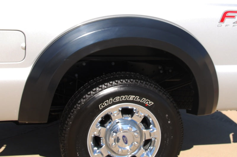 Load image into Gallery viewer, Lund 11-16 Ford F-250 Ex-Extrawide Style Smooth Elite Series Fender Flares - Black (4 Pc.)
