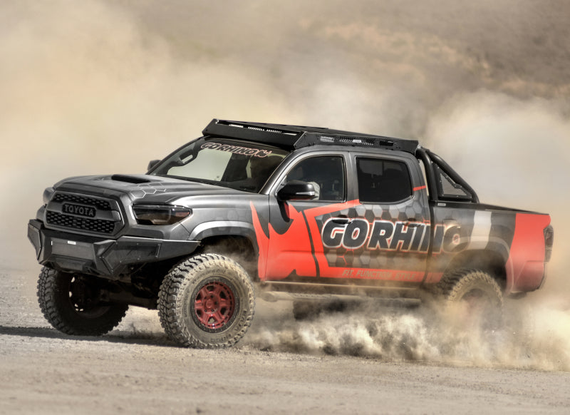 Load image into Gallery viewer, Go Rhino 16-21 Tacoma Element Front Bumper w/ Power Actuated Hide-away Light Bar Mount Tex Black
