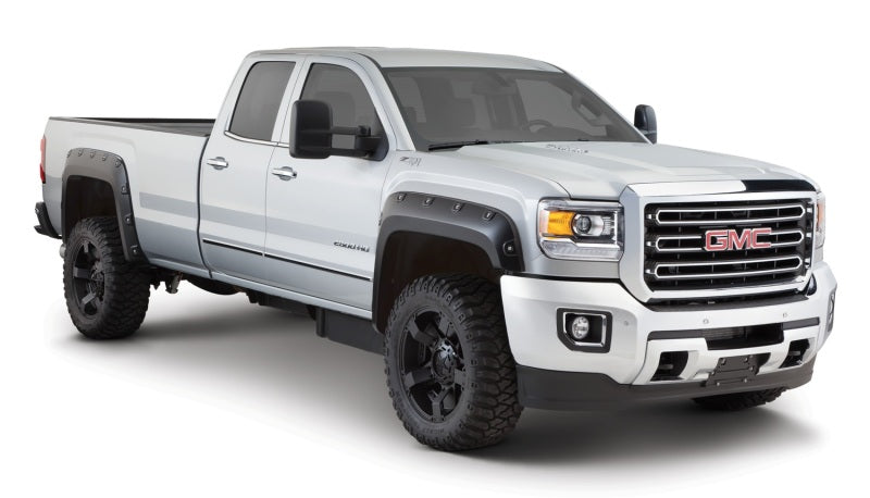 Load image into Gallery viewer, Bushwacker 15-18 GMC Sierra 2500 HD Boss Pocket Style Flares 4pc 78.8/97.6in Bed - Black
