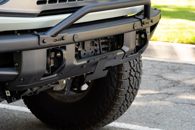 Load image into Gallery viewer, DV8 Offroad 21-22 Ford Bronco Factory Front Bumper Licence Relocation Bracket - Front
